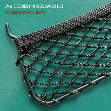 Close-up of BMW F10 trunk cargo net edge; factory outer frame not included