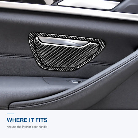 Carbon fiber trim installed around the interior door handle in a BMW G30